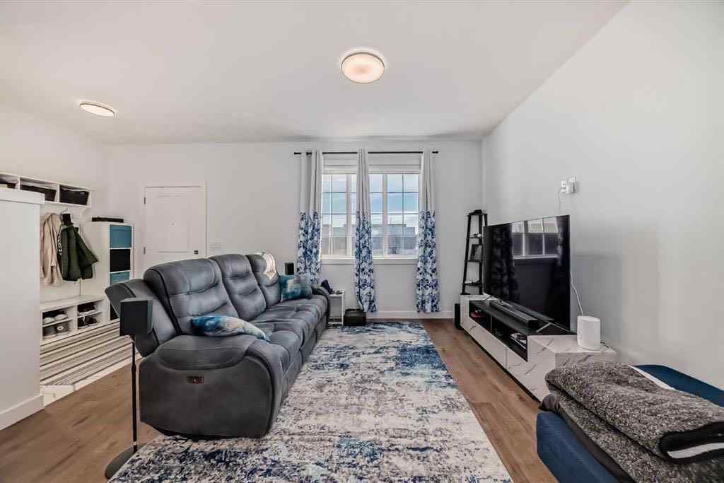 MLS® A2236352 - 144 Merganser Drive W in Dawson\'s Landing Chestermere, Residential