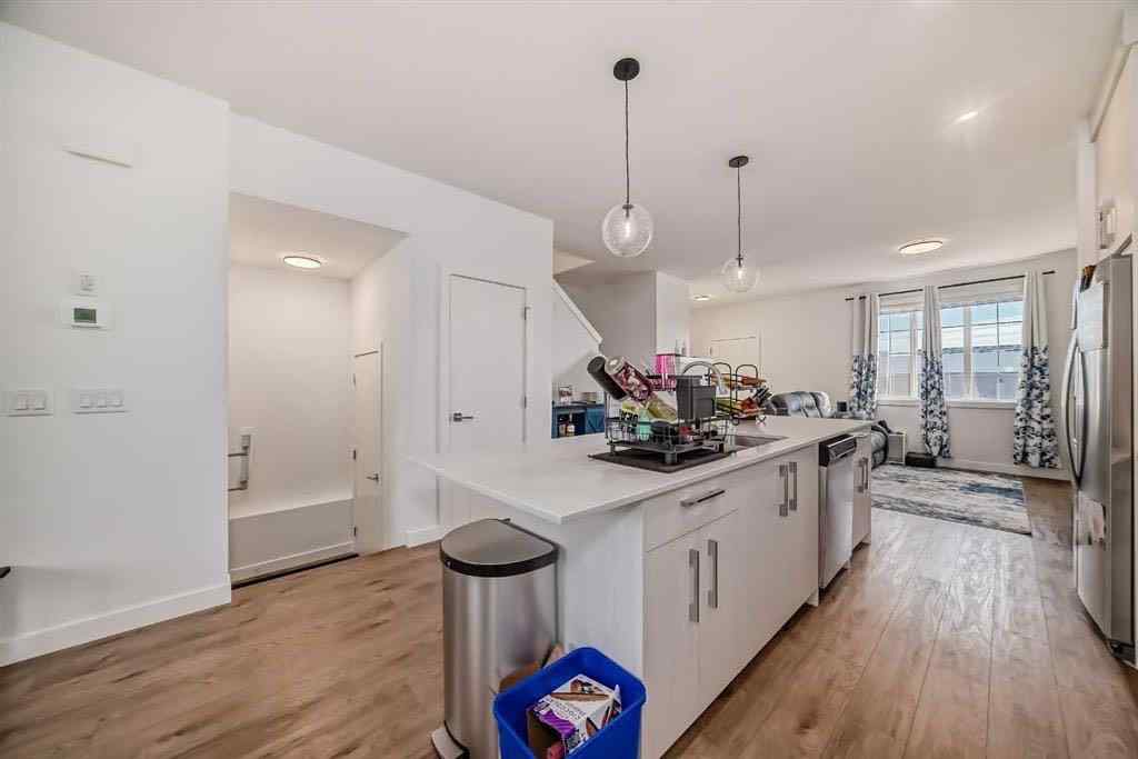 MLS® A2236352 - 144 Merganser Drive W in Dawson\'s Landing Chestermere, Residential