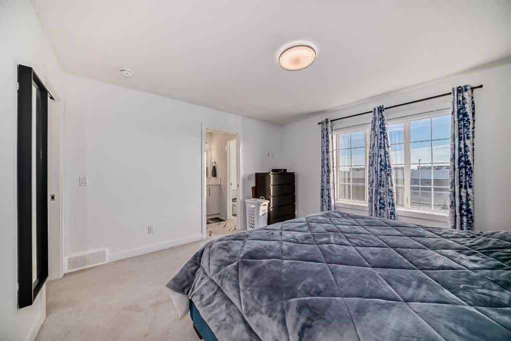 MLS® A2236352 - 144 Merganser Drive W in Dawson\'s Landing Chestermere, Residential