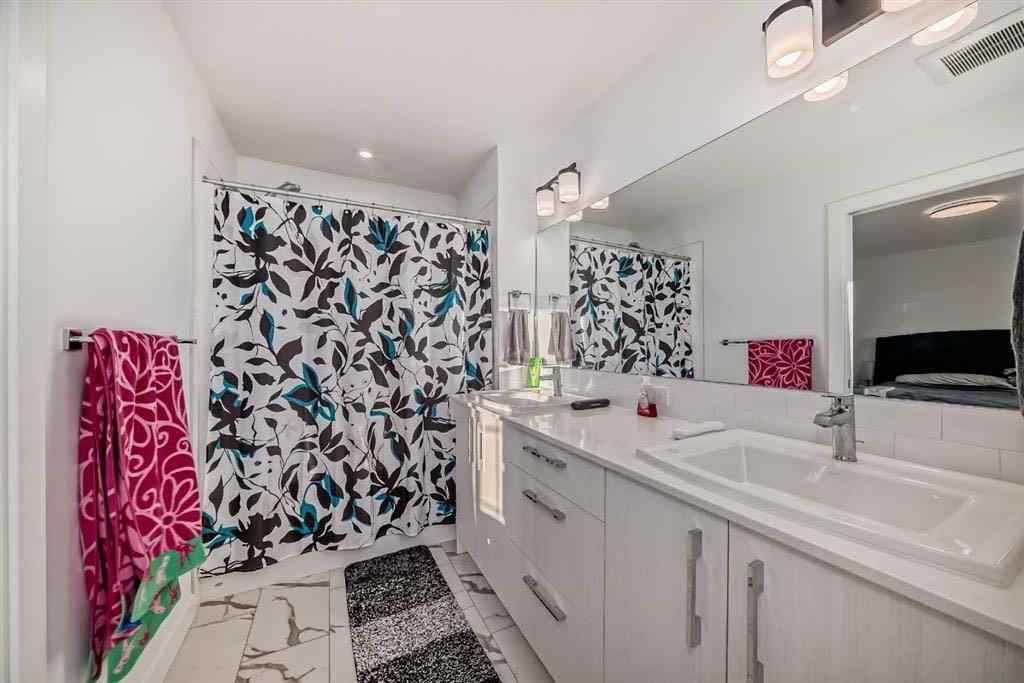 MLS® A2236352 - 144 Merganser Drive W in Dawson\'s Landing Chestermere, Residential
