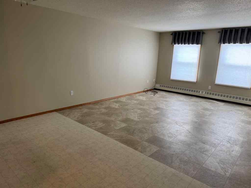 MLS® A2236392 - Unit #208 5026 49 Street  in NONE Olds, Residential