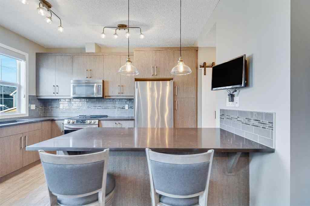 MLS® A2236396 - 297 Mahogany Boulevard SE in Mahogany Calgary, Residential