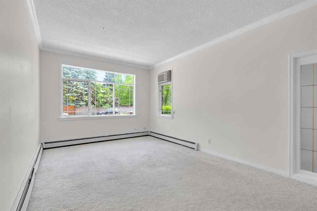 MLS® A2236443 - Unit #108 9449 19 Street SW in Palliser Calgary, Residential