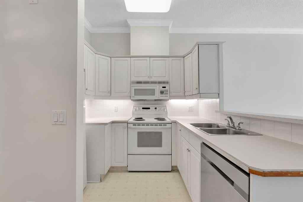MLS® A2236443 - Unit #108 9449 19 Street SW in Palliser Calgary, Residential