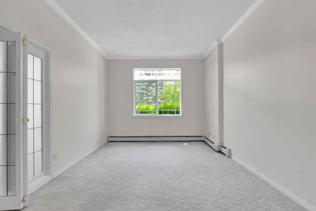 MLS® A2236443 - Unit #108 9449 19 Street SW in Palliser Calgary, Residential