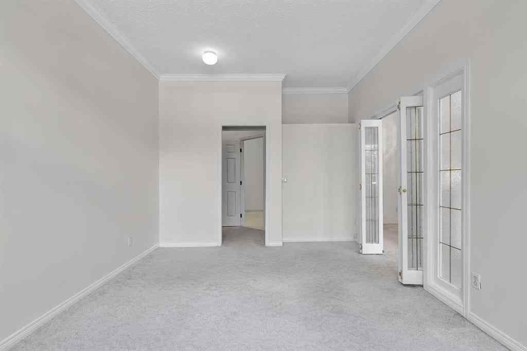 MLS® A2236443 - Unit #108 9449 19 Street SW in Palliser Calgary, Residential