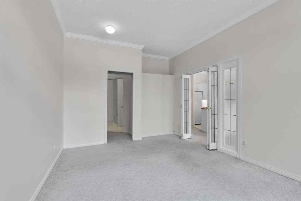 MLS® A2236443 - Unit #108 9449 19 Street SW in Palliser Calgary, Residential