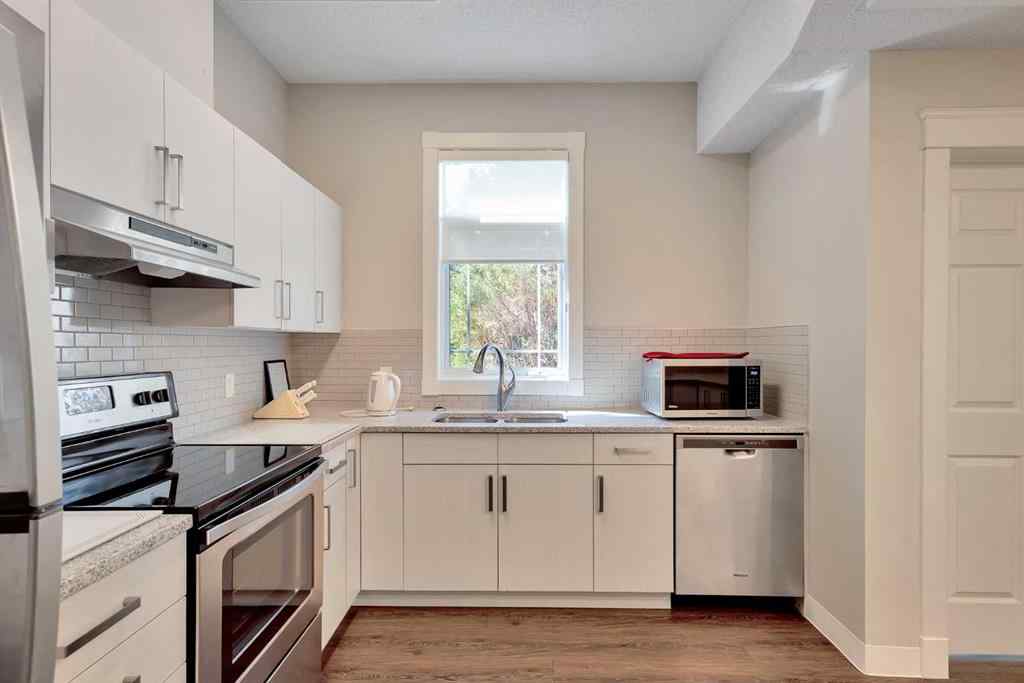 MLS® A2236443 - Unit #108 9449 19 Street SW in Palliser Calgary, Residential