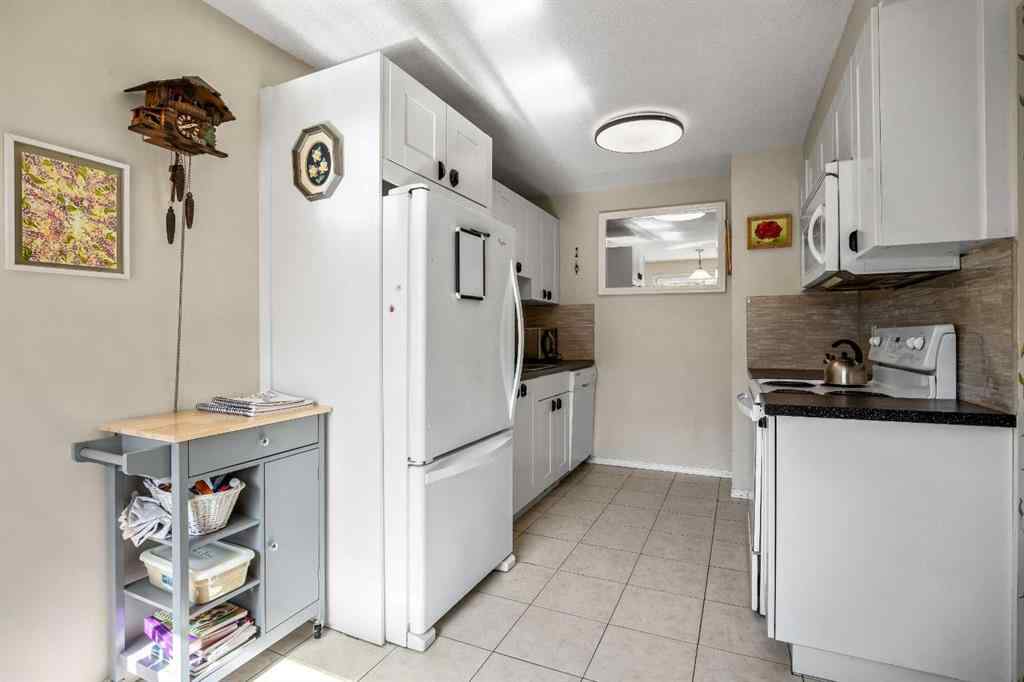 MLS® A2236496 - Unit #49 4936 DALTON Drive NW in Dalhousie Calgary, Residential