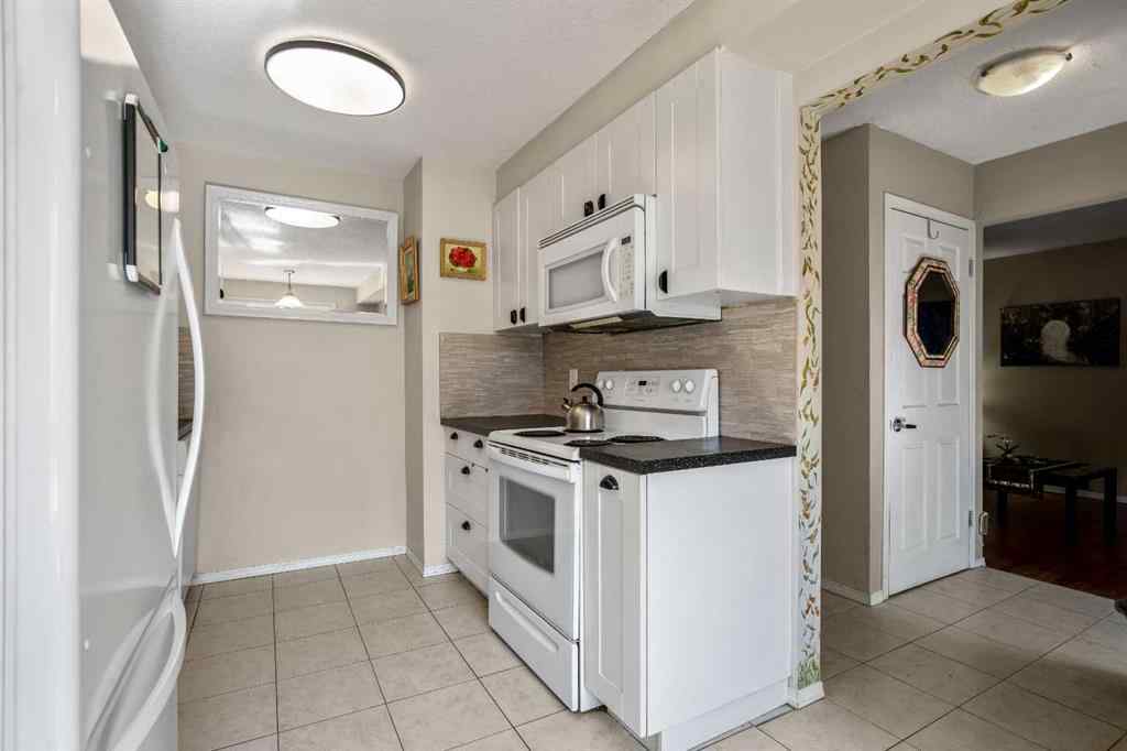 MLS® A2236496 - Unit #49 4936 DALTON Drive NW in Dalhousie Calgary, Residential
