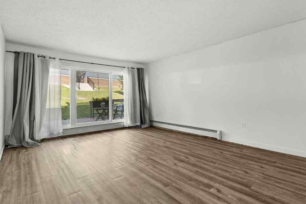 MLS® A2236616 - Unit #110 816 89 Avenue SW in Haysboro Calgary, Residential