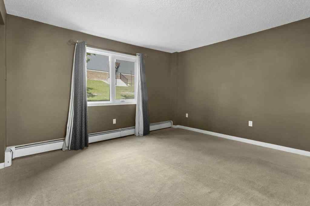 MLS® A2236616 - Unit #110 816 89 Avenue SW in Haysboro Calgary, Residential