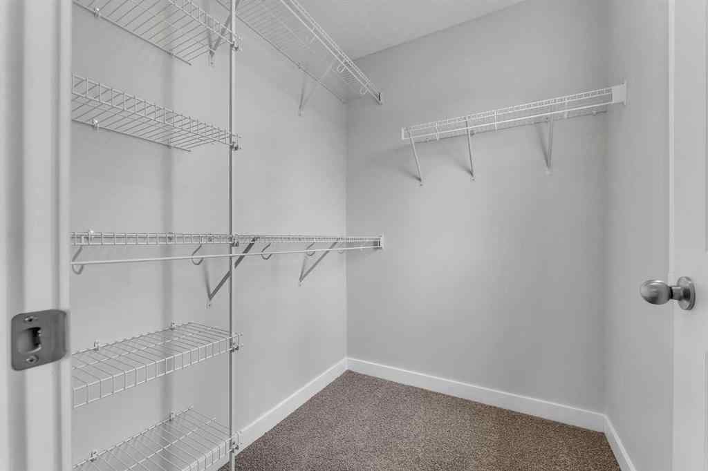 MLS® A2236628 - 822, 826, 830, 834 Wolf Willow Boulevard SE in Wolf Willow Calgary, Multi-Family