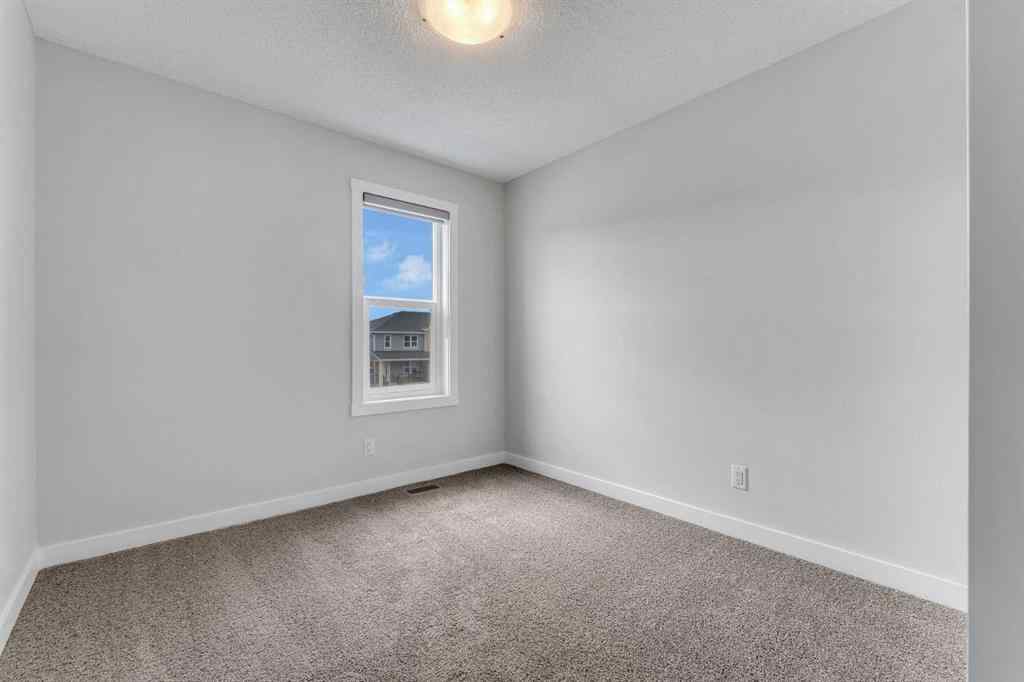 MLS® A2236628 - 822, 826, 830, 834 Wolf Willow Boulevard SE in Wolf Willow Calgary, Multi-Family