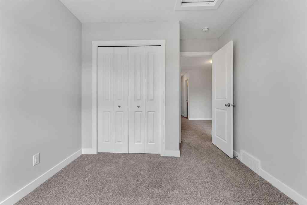 MLS® A2236628 - 822, 826, 830, 834 Wolf Willow Boulevard SE in Wolf Willow Calgary, Multi-Family