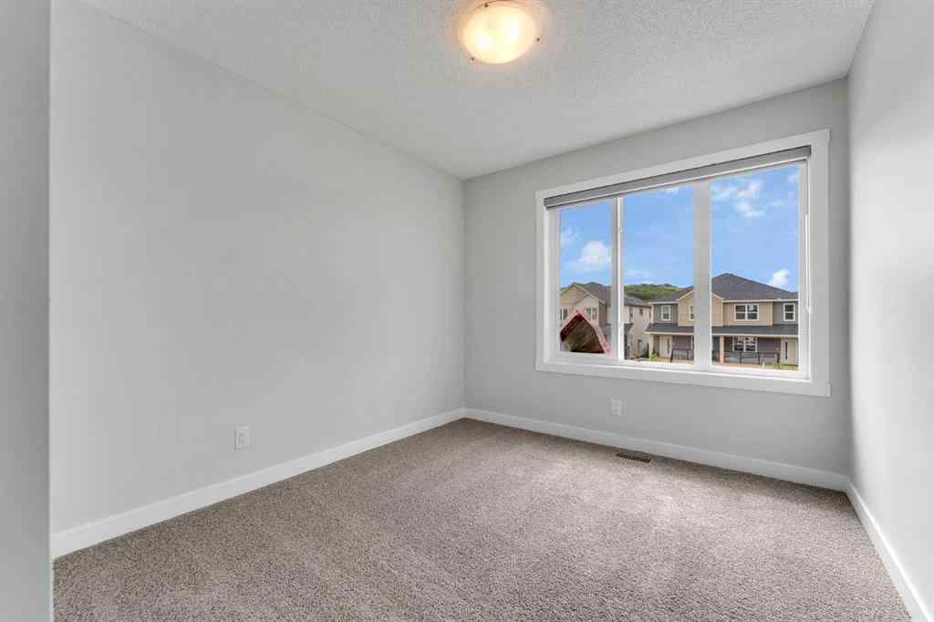 MLS® A2236628 - 822, 826, 830, 834 Wolf Willow Boulevard SE in Wolf Willow Calgary, Multi-Family