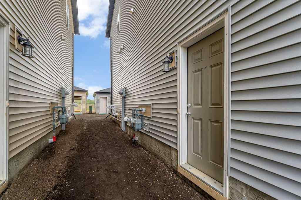 MLS® A2236628 - 822, 826, 830, 834 Wolf Willow Boulevard SE in Wolf Willow Calgary, Multi-Family
