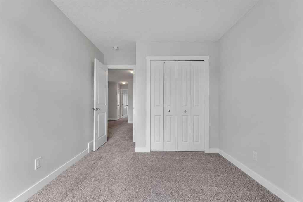 MLS® A2236628 - 822, 826, 830, 834 Wolf Willow Boulevard SE in Wolf Willow Calgary, Multi-Family