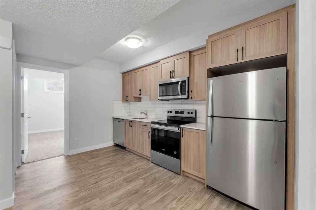 MLS® A2236628 - 822, 826, 830, 834 Wolf Willow Boulevard SE in Wolf Willow Calgary, Multi-Family