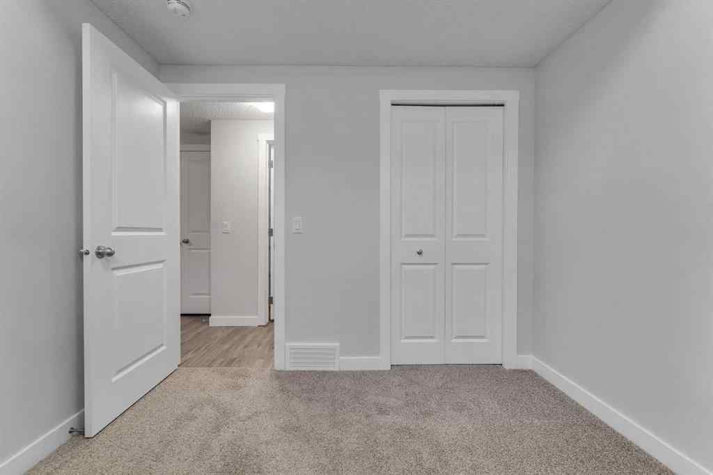 MLS® A2236628 - 822, 826, 830, 834 Wolf Willow Boulevard SE in Wolf Willow Calgary, Multi-Family