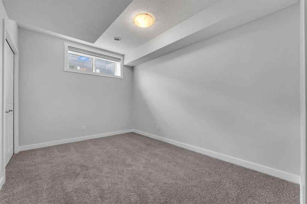 MLS® A2236628 - 822, 826, 830, 834 Wolf Willow Boulevard SE in Wolf Willow Calgary, Multi-Family