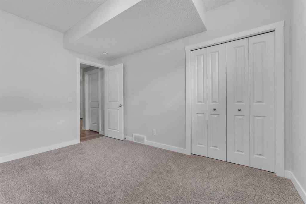 MLS® A2236628 - 822, 826, 830, 834 Wolf Willow Boulevard SE in Wolf Willow Calgary, Multi-Family
