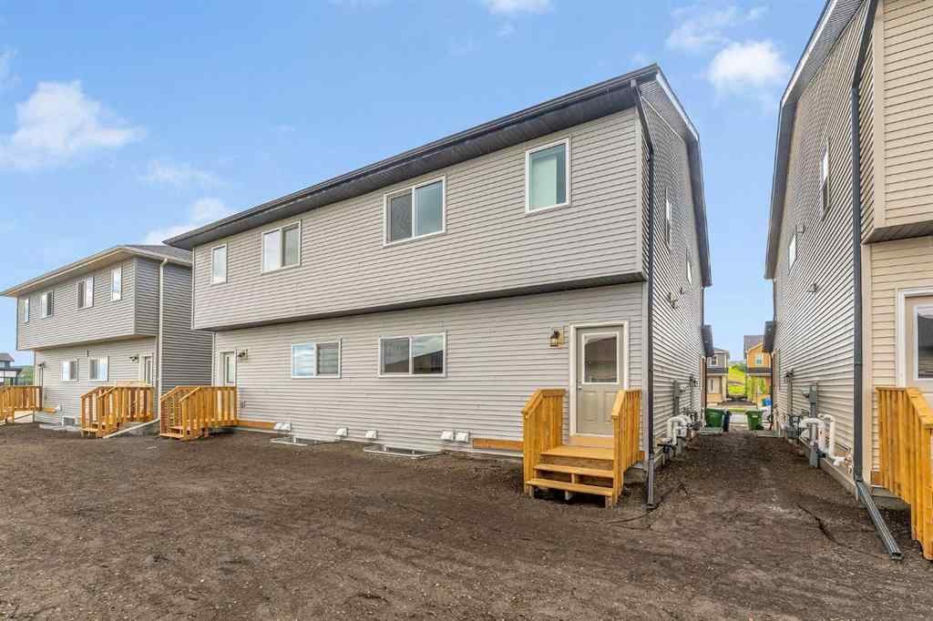 MLS® A2236628 - 822, 826, 830, 834 Wolf Willow Boulevard SE in Wolf Willow Calgary, Multi-Family