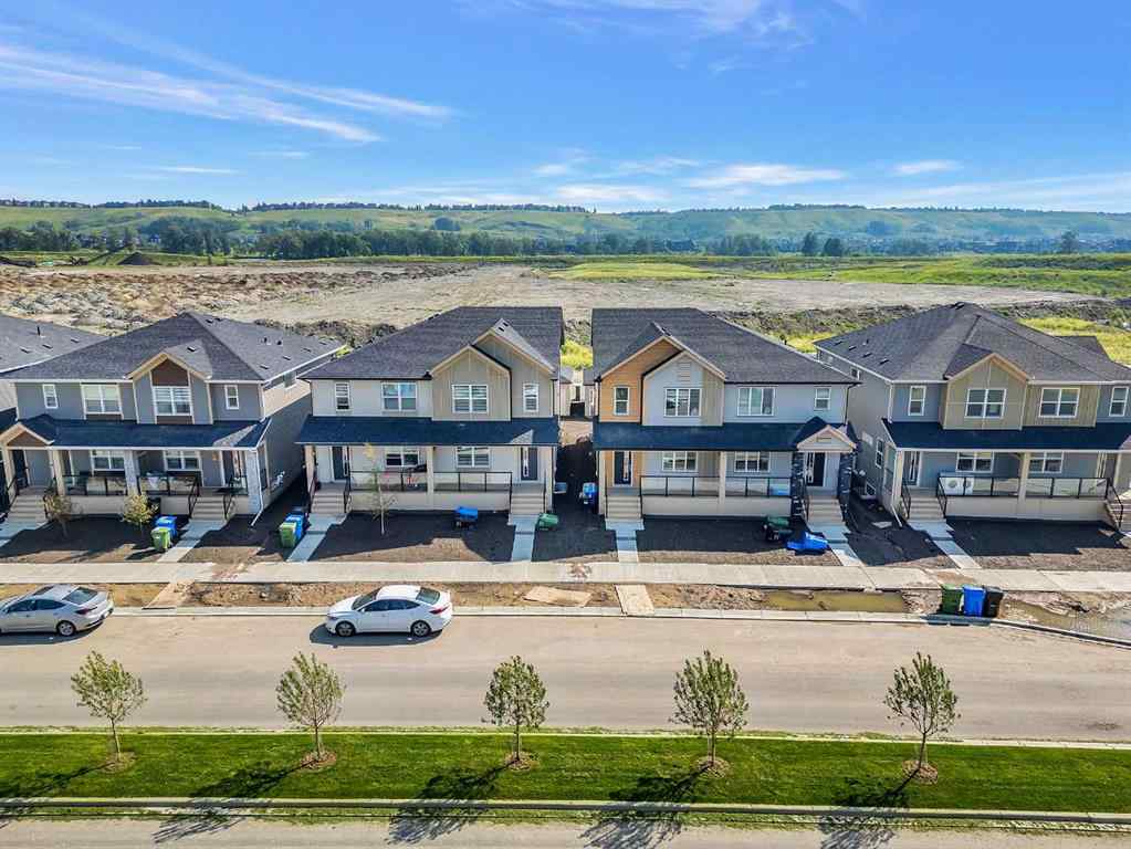 MLS® A2236628 - 822, 826, 830, 834 Wolf Willow Boulevard SE in Wolf Willow Calgary, Multi-Family