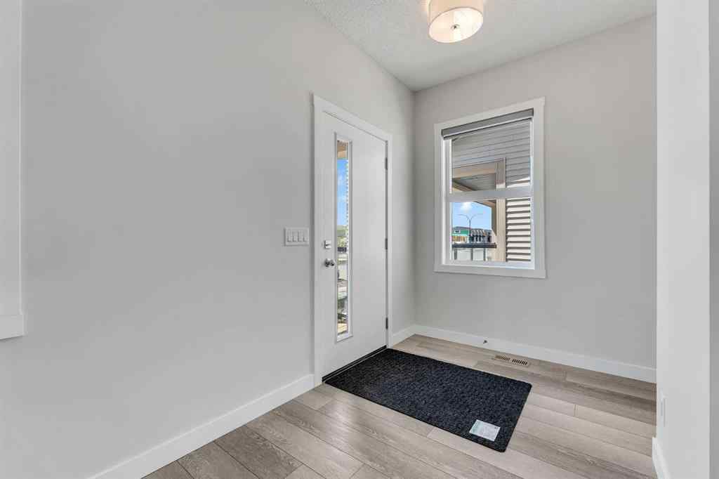 MLS® A2236628 - 822, 826, 830, 834 Wolf Willow Boulevard SE in Wolf Willow Calgary, Multi-Family
