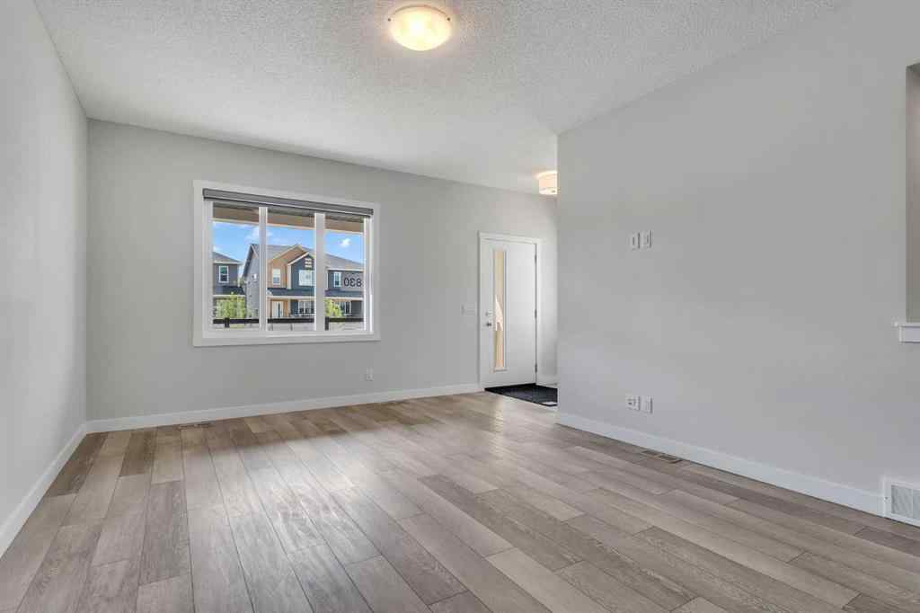 MLS® A2236628 - 822, 826, 830, 834 Wolf Willow Boulevard SE in Wolf Willow Calgary, Multi-Family