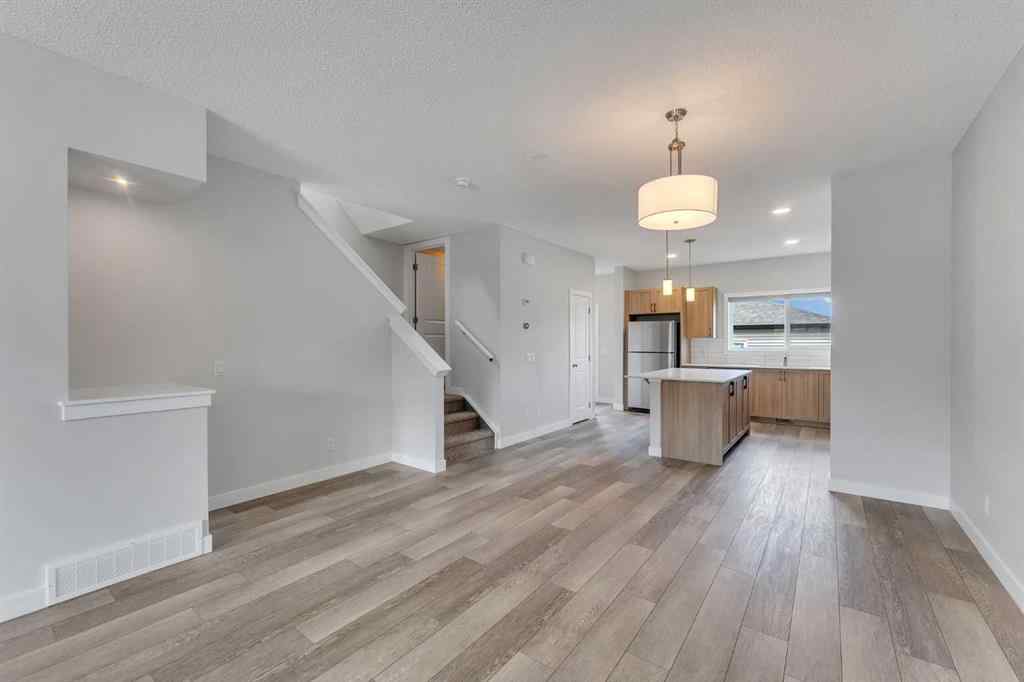 MLS® A2236628 - 822, 826, 830, 834 Wolf Willow Boulevard SE in Wolf Willow Calgary, Multi-Family
