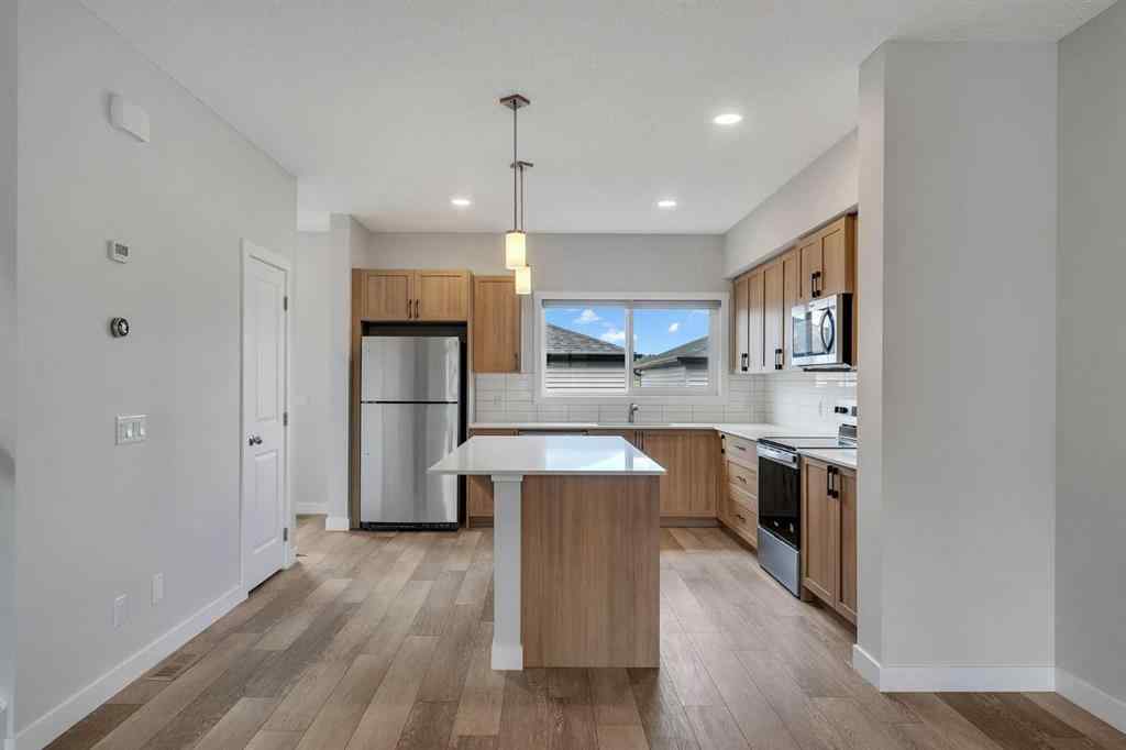 MLS® A2236628 - 822, 826, 830, 834 Wolf Willow Boulevard SE in Wolf Willow Calgary, Multi-Family