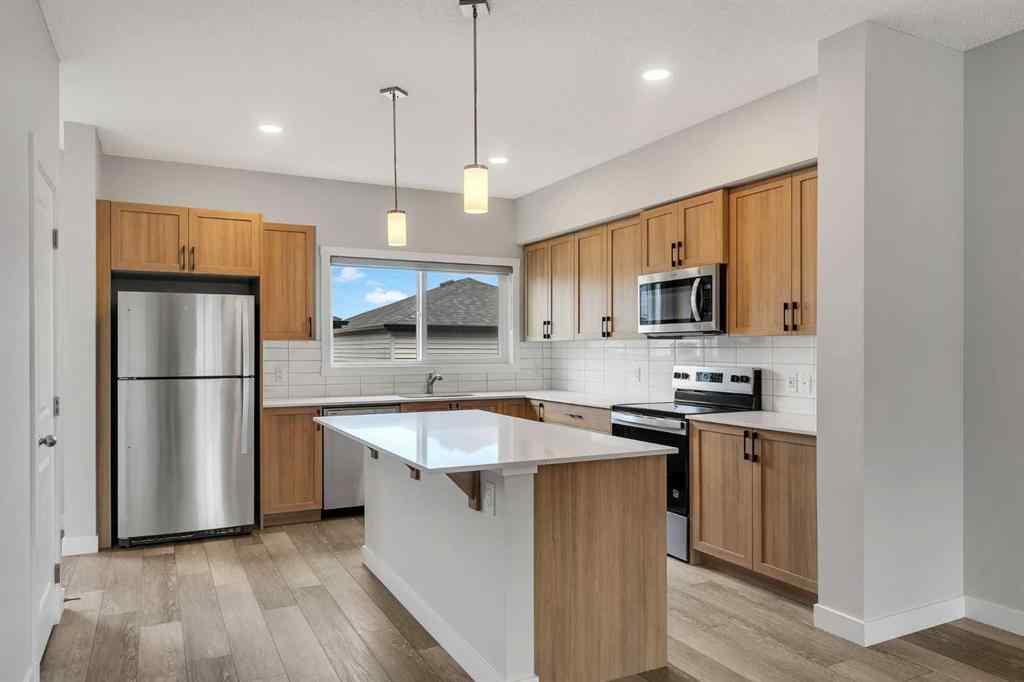 MLS® A2236628 - 822, 826, 830, 834 Wolf Willow Boulevard SE in Wolf Willow Calgary, Multi-Family
