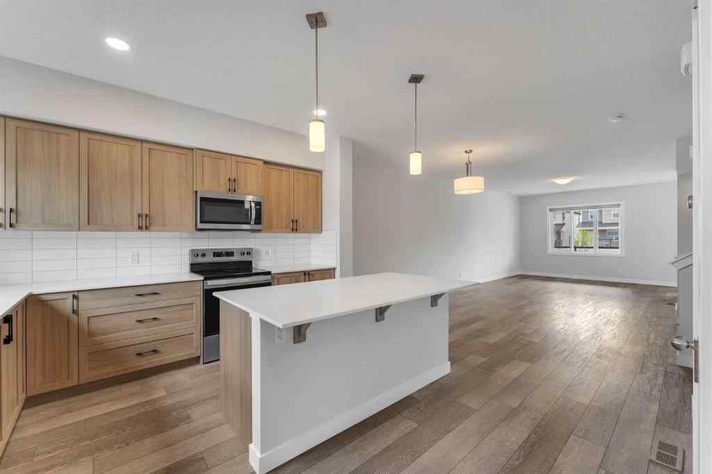 MLS® A2236628 - 822, 826, 830, 834 Wolf Willow Boulevard SE in Wolf Willow Calgary, Multi-Family