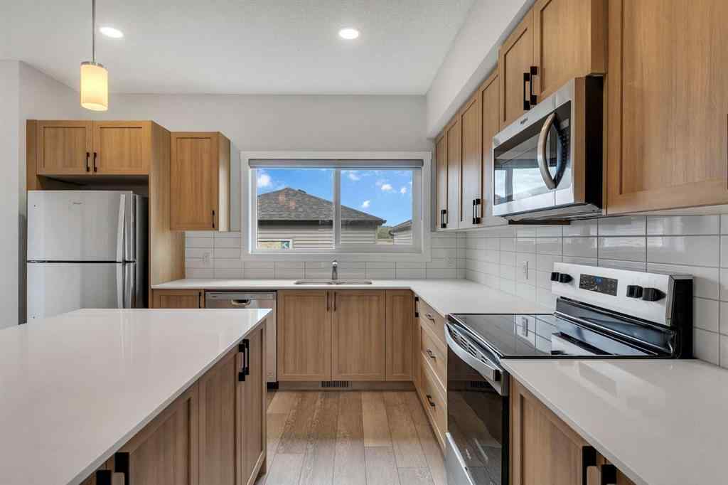 MLS® A2236628 - 822, 826, 830, 834 Wolf Willow Boulevard SE in Wolf Willow Calgary, Multi-Family