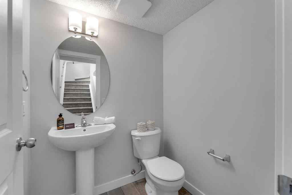 MLS® A2236628 - 822, 826, 830, 834 Wolf Willow Boulevard SE in Wolf Willow Calgary, Multi-Family