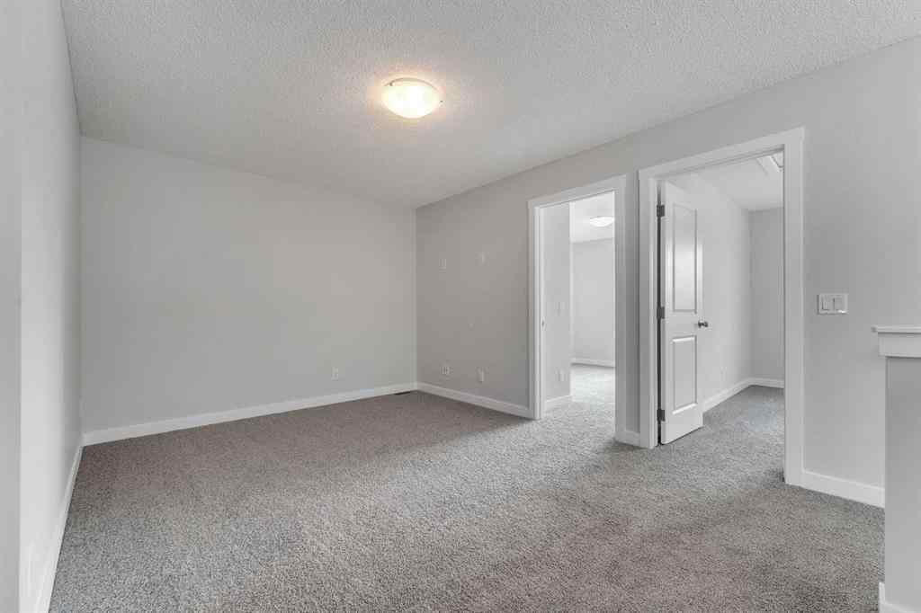 MLS® A2236628 - 822, 826, 830, 834 Wolf Willow Boulevard SE in Wolf Willow Calgary, Multi-Family