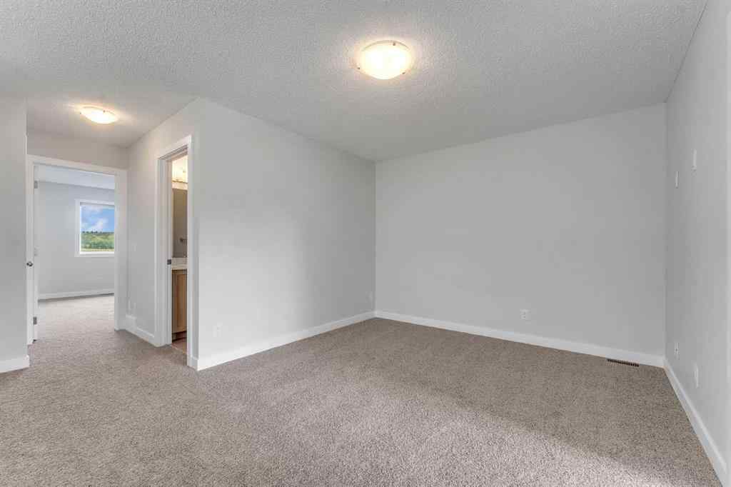 MLS® A2236628 - 822, 826, 830, 834 Wolf Willow Boulevard SE in Wolf Willow Calgary, Multi-Family