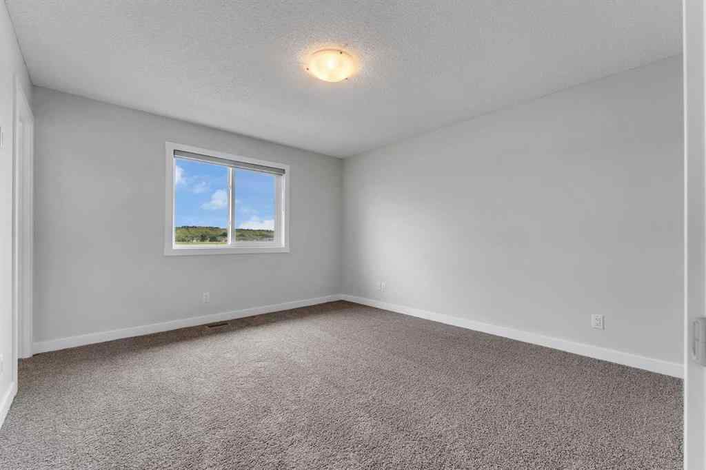 MLS® A2236628 - 822, 826, 830, 834 Wolf Willow Boulevard SE in Wolf Willow Calgary, Multi-Family