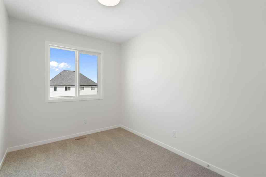 MLS® A2236649 - 135 Creekview Gardens SW in Pine Creek Calgary, Residential