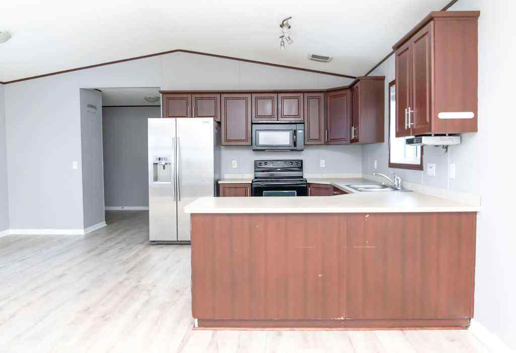 MLS® A2236675 - 209 Greely Road  in Gregoire Park Fort McMurray, Residential