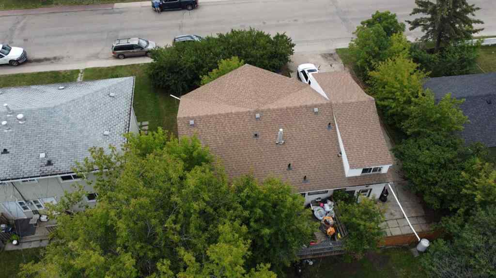 MLS® A2236685 - 10120 103 Avenue  in Avondale Grande Prairie, Multi-Family