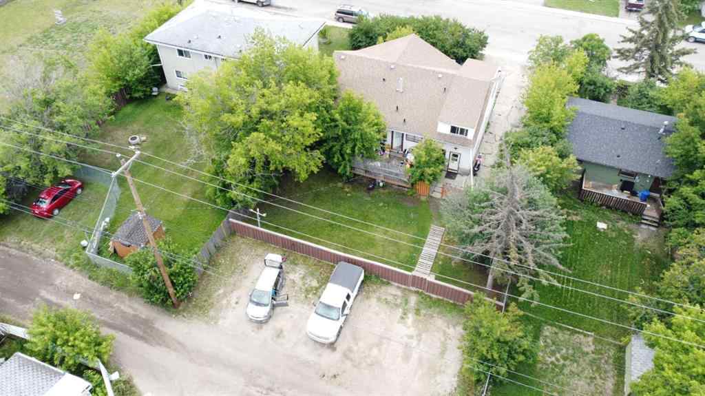 MLS® A2236685 - 10120 103 Avenue  in Avondale Grande Prairie, Multi-Family