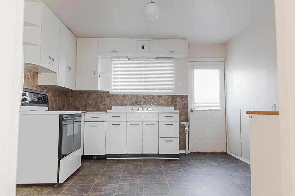 MLS® A2236685 - 10120 103 Avenue  in Avondale Grande Prairie, Multi-Family
