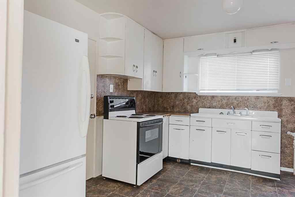 MLS® A2236685 - 10120 103 Avenue  in Avondale Grande Prairie, Multi-Family