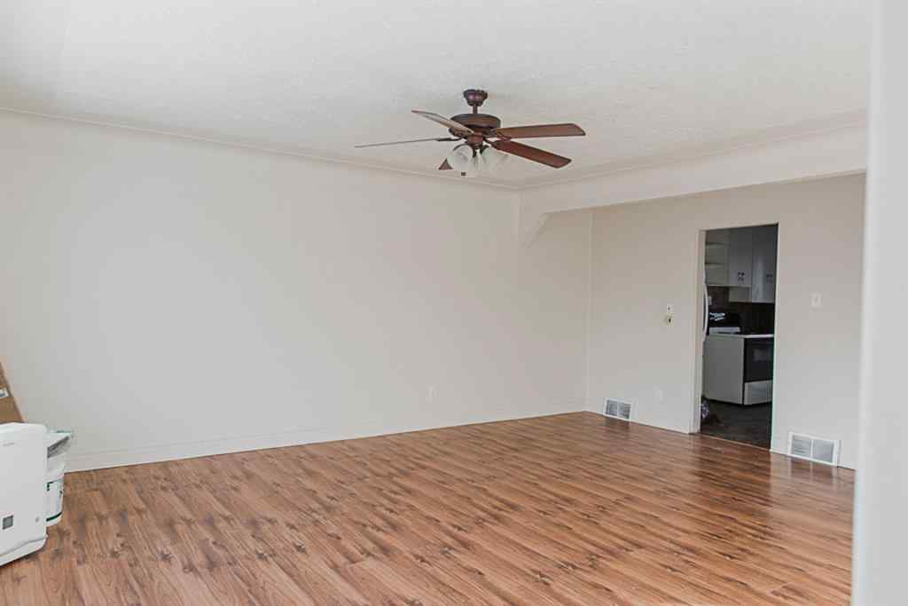 MLS® A2236685 - 10120 103 Avenue  in Avondale Grande Prairie, Multi-Family