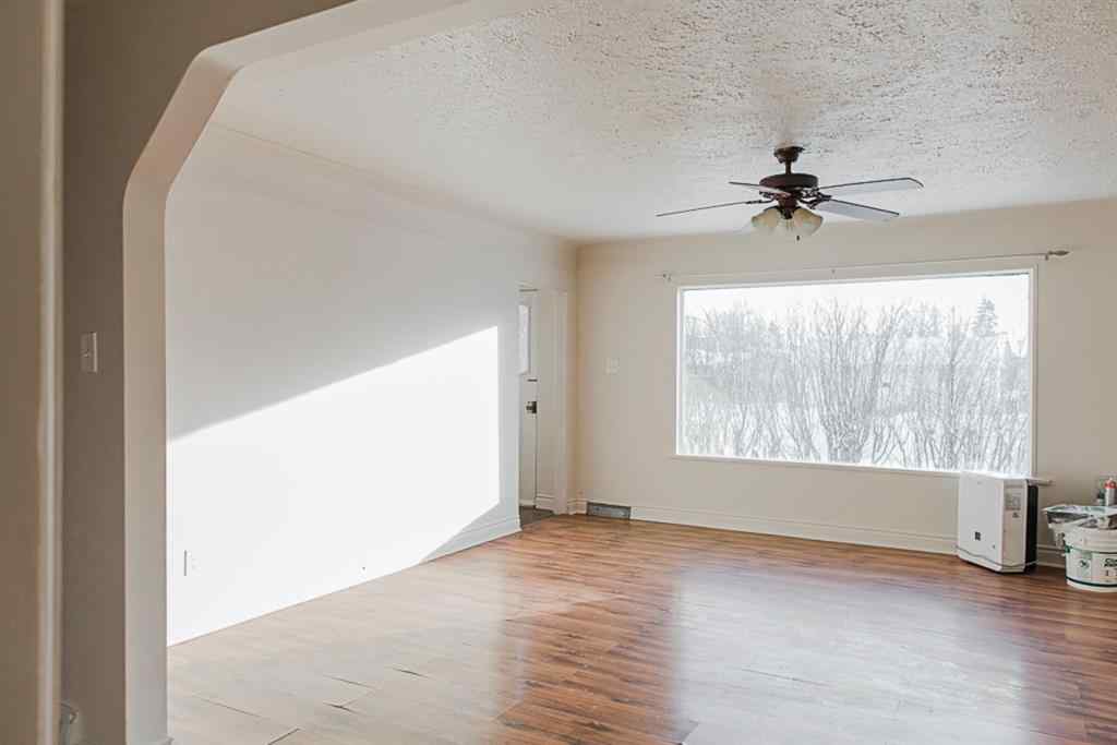 MLS® A2236685 - 10120 103 Avenue  in Avondale Grande Prairie, Multi-Family
