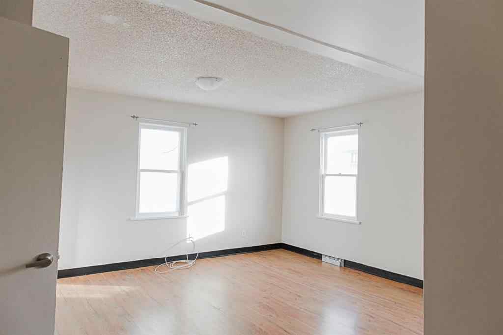 MLS® A2236685 - 10120 103 Avenue  in Avondale Grande Prairie, Multi-Family