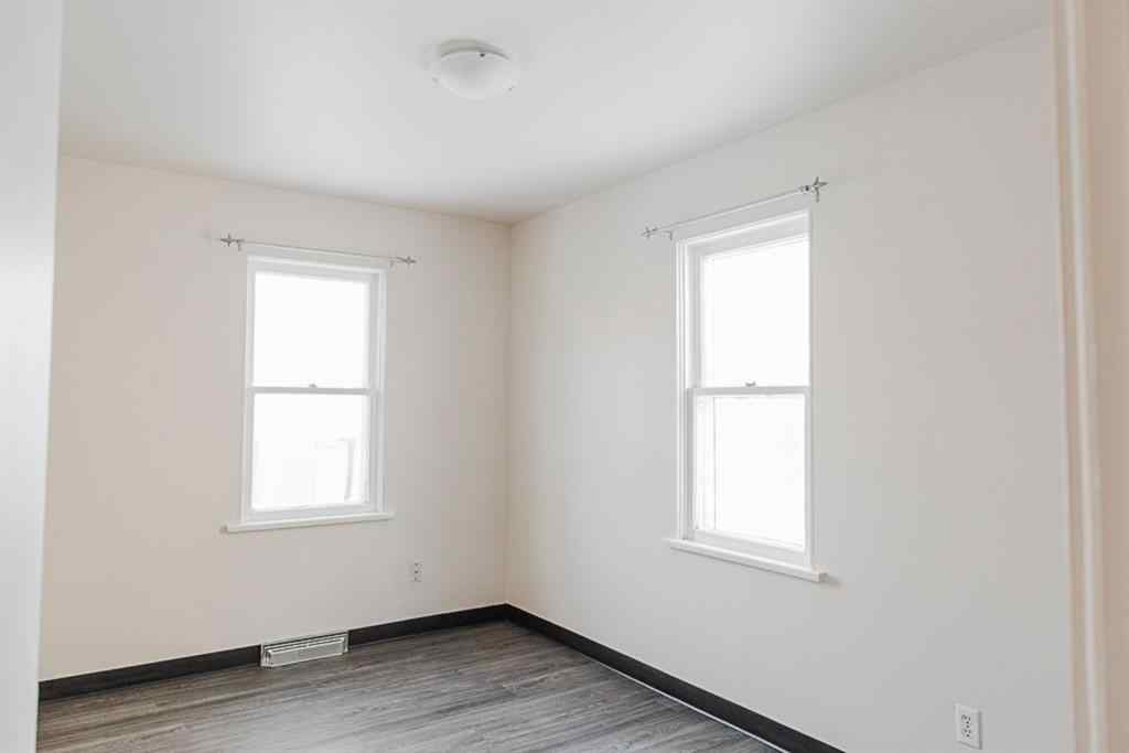 MLS® A2236685 - 10120 103 Avenue  in Avondale Grande Prairie, Multi-Family