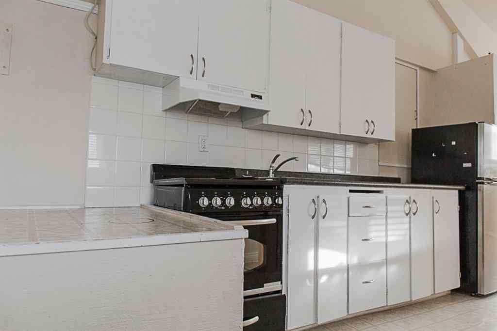 MLS® A2236685 - 10120 103 Avenue  in Avondale Grande Prairie, Multi-Family